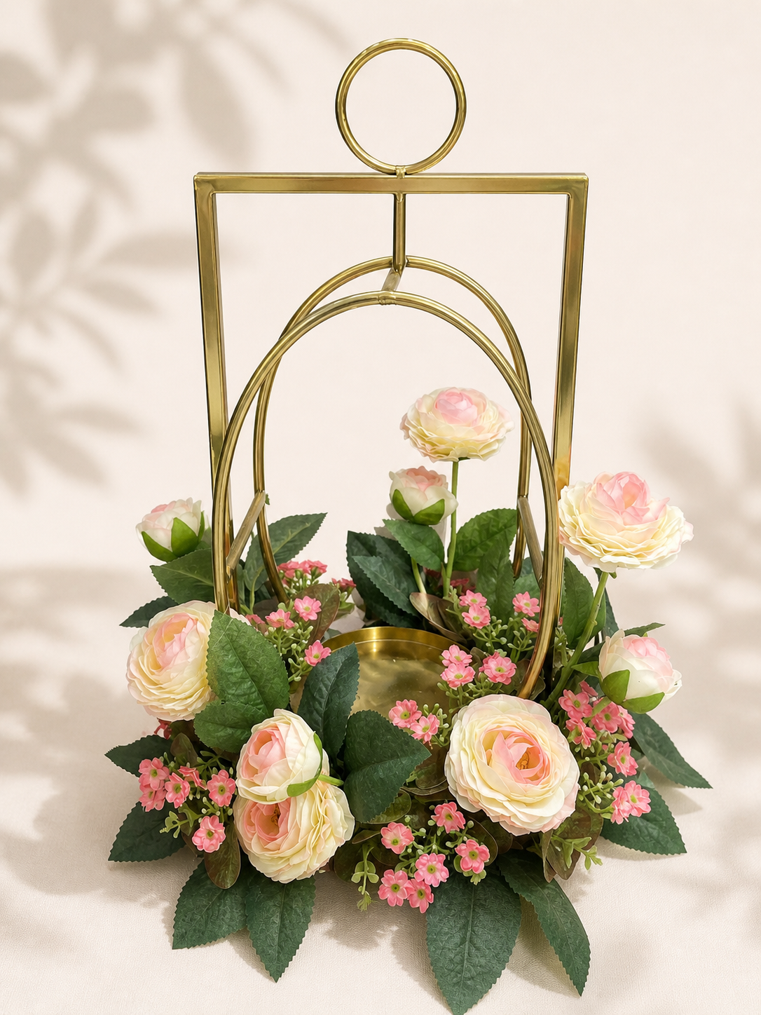Candle stand with artificial flowers
